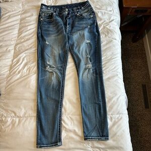 Women's Distressed Blue Jeans